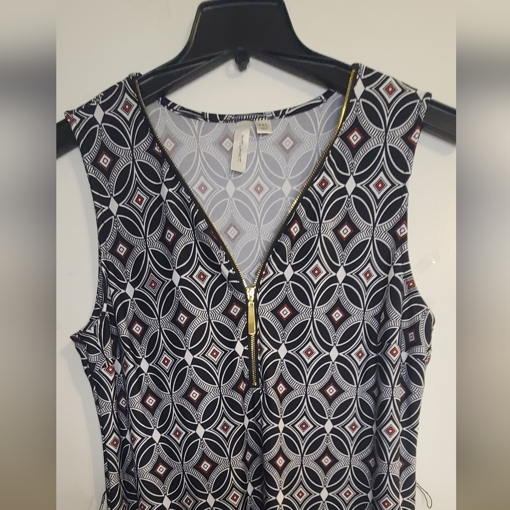 Tacera Black And Whithe Geometric Pattern Top. It has eyelets for a headband but - Picture 3 of 12